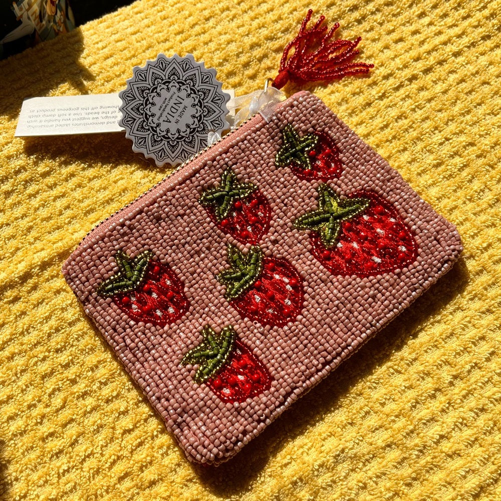 Strawberry beaded coin purse.
